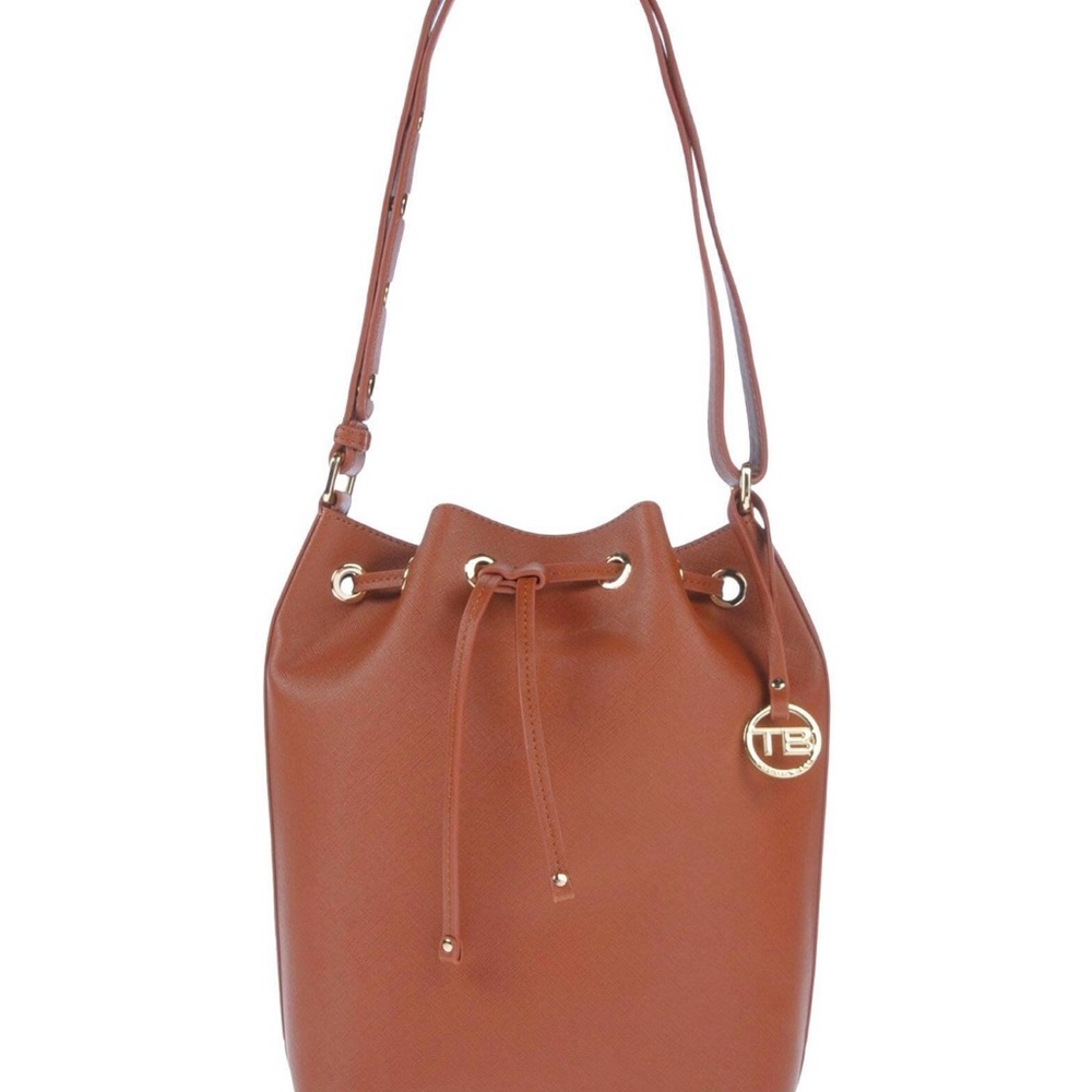 Shopper back. Faux leather. Used. Good used condition. No flaws.